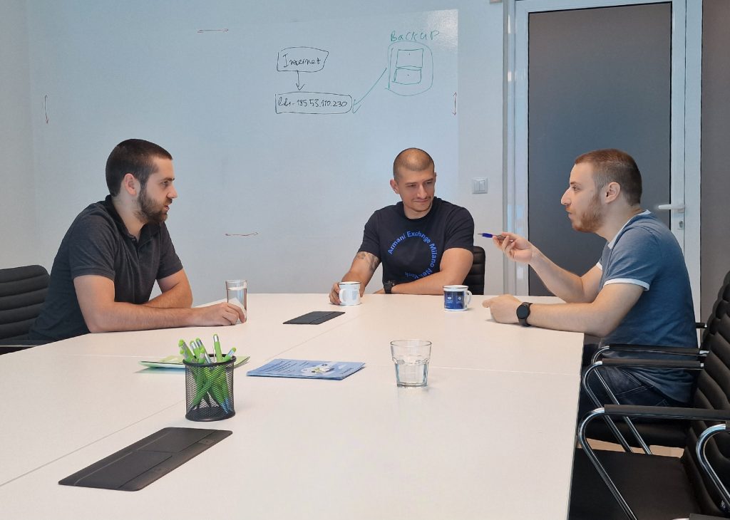 Tom Atanasov (right), Borislav Stoyanov (left), and Valentin Dzhorov (in the middle) - discussing a case in the conference room at hosting Jump.